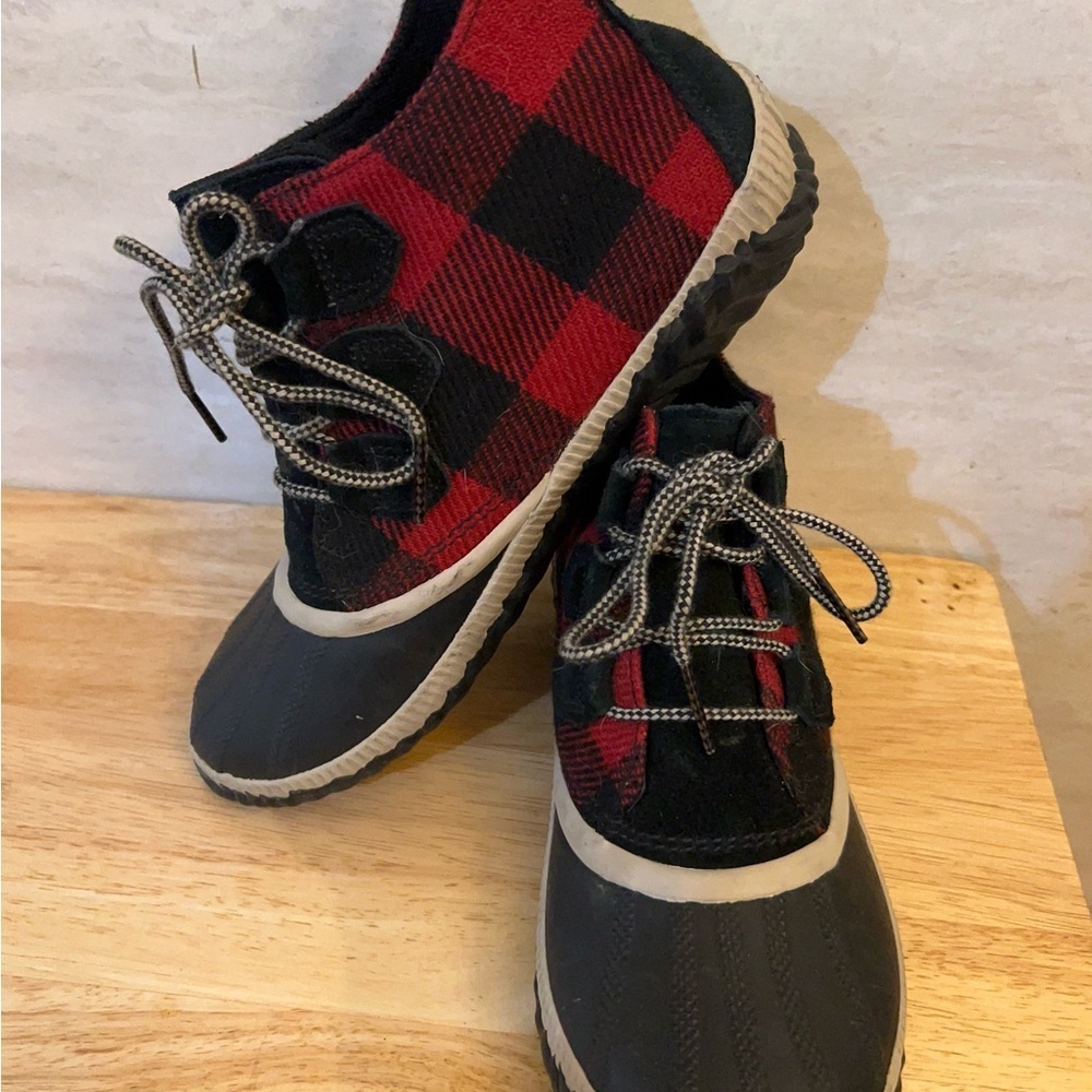 Sorel Out 'N About Plus duck boots in a red and black buffalo plaid pattern. - Picture 3 of 10